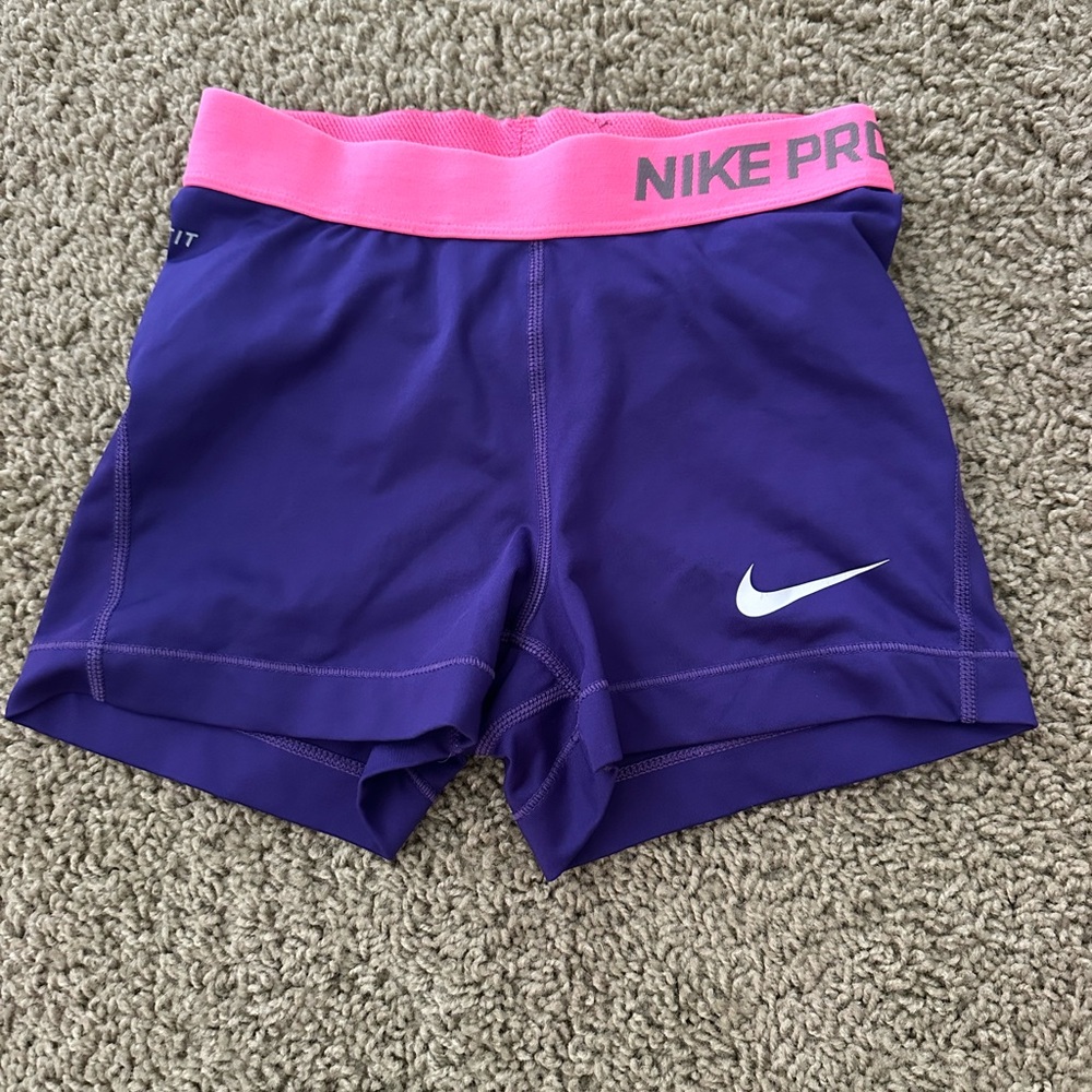 purple and pink nike pro shorts